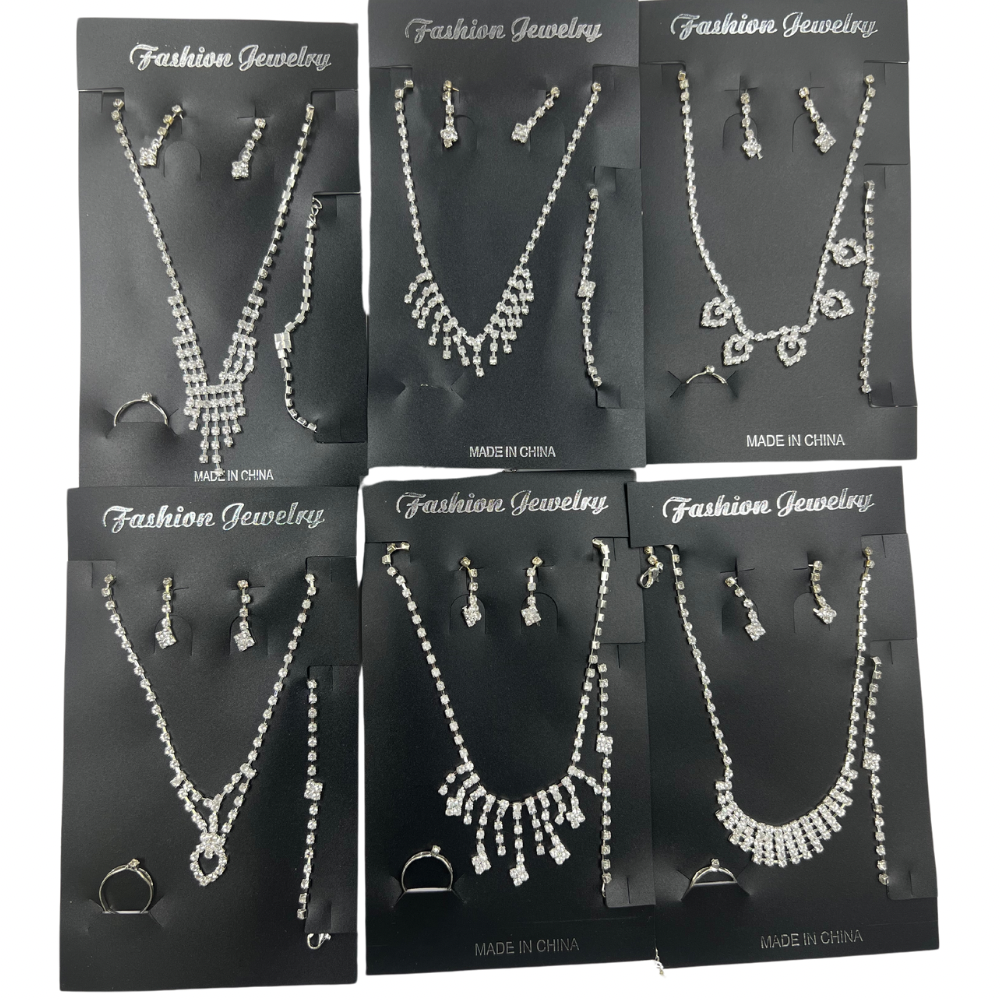 Set de cadenas y pulseras con aretes y anillo paquete x docena (71-2)