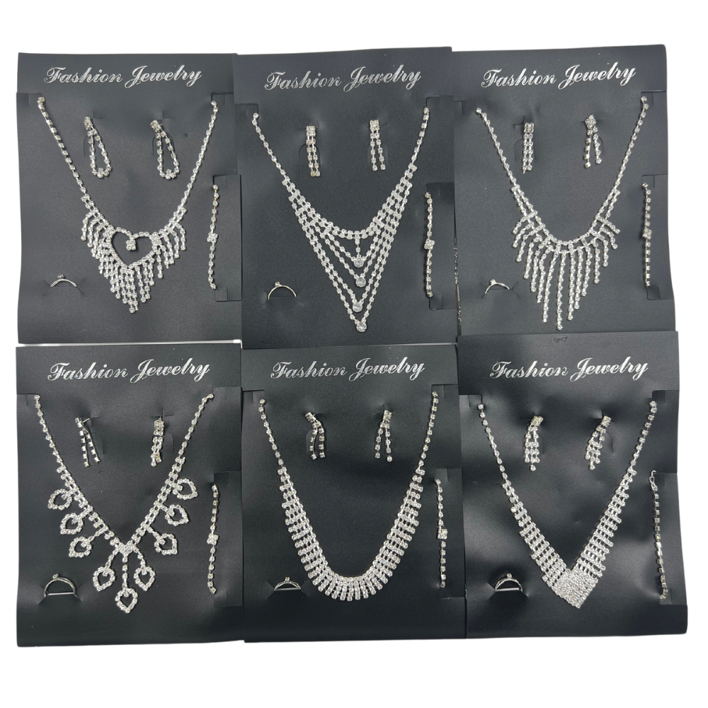 Set de cadenas y pulseras con aretes y anillo paquete x docena (71-1)